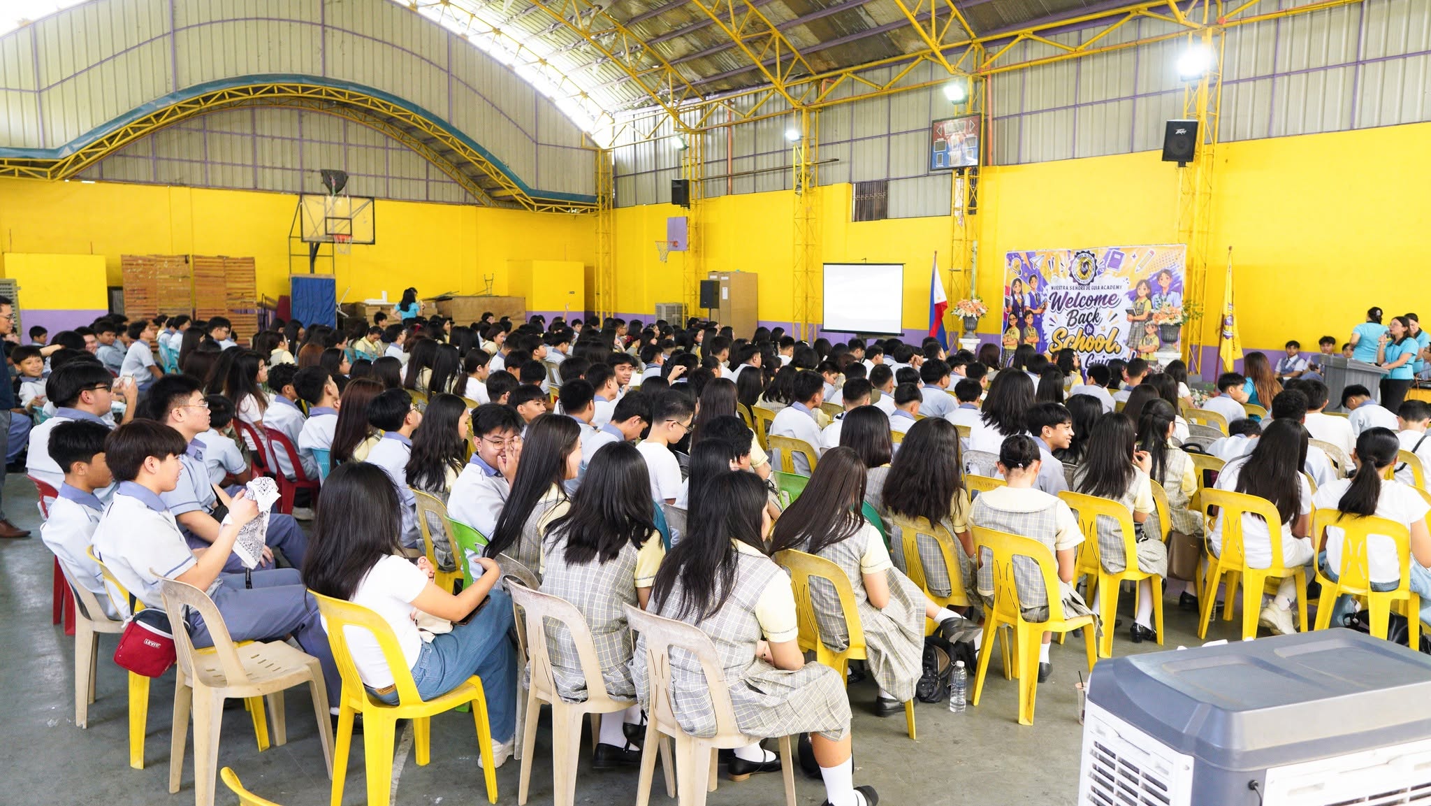 NSDGA students gathered for a school calendar program