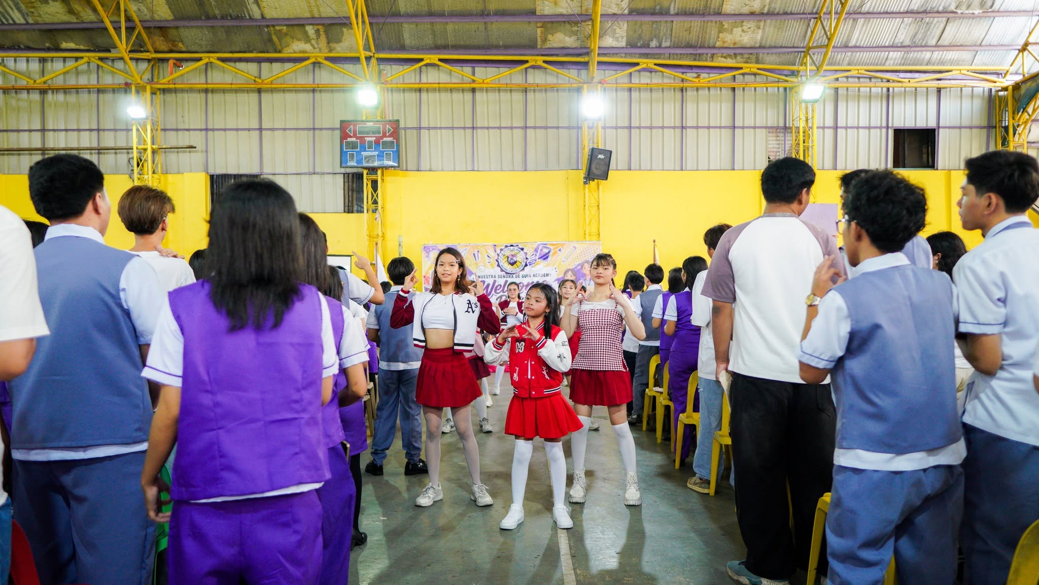 NSDGA students welcoming returning Guians during the school program